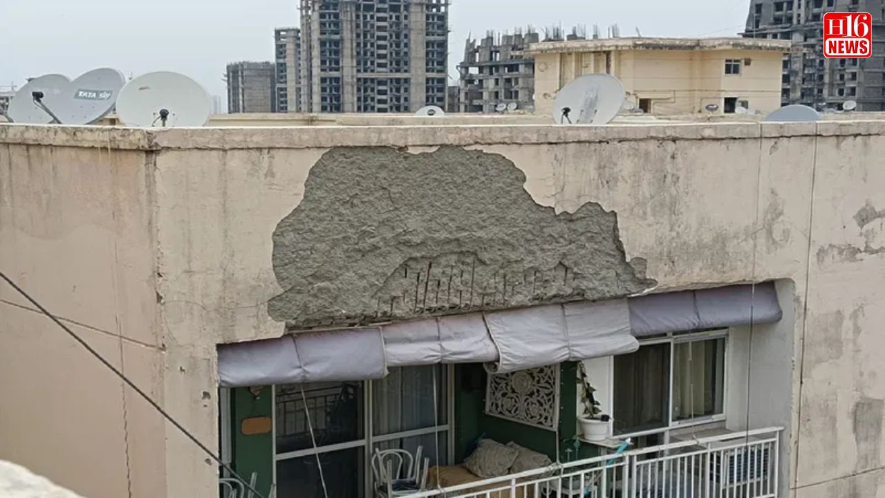 Facade of Noida tower collapses, damages vehicle